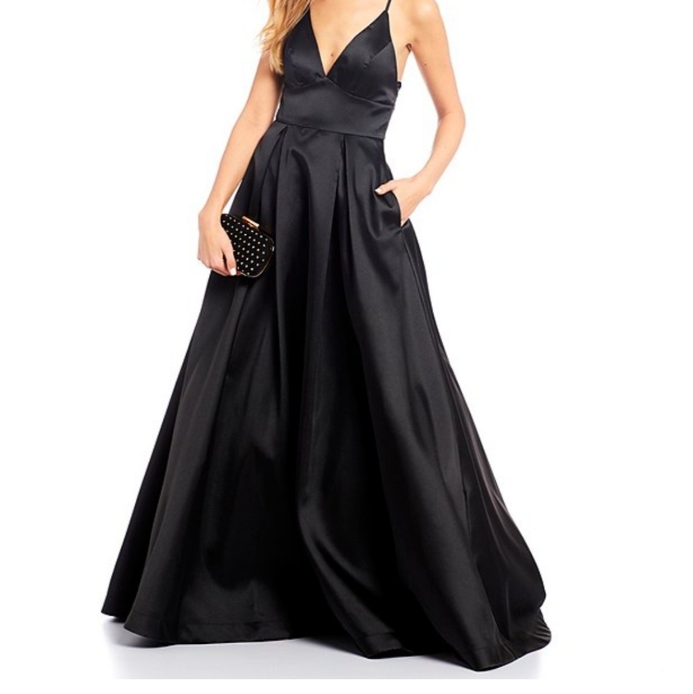 B. DARLIN VNECK TIE BACK SATIN BALL GOWN
